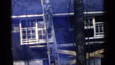 Birmingham Alabama (1957): A Bulldozer Shoveling Dirt Into A Pile By A House Being