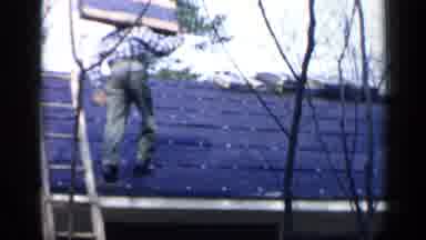 Birmingham Alabama (1957): Man Carries Supplies Up Slope Then Another Man Works On