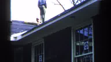 Birmingham Alabama (1957): Two Men Talking On The Roof