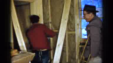 Birmingham Alabama (1957): Male Carpenters Hammering Nails Into The Wood Of A