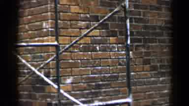 Birmingham Alabama (1957): View Of Brick Wall And Scaffolding On A Clear Day