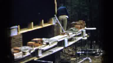 Birmingham Alabama (1957): Bricklayers At Work On The Foundation Of A House In The