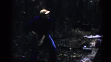 Birmingham Alabama (1957): Man Tosses Bricks To Two Men Working Above On