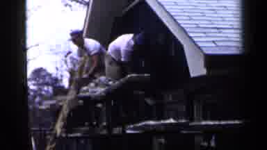 Birmingham Alabama (1957): House Builders Working On The Roof By The Front Of The
