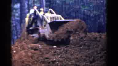 Birmingham Alabama (1957): Dirt Digger With Two Male Workers Pushes Dirt Over The