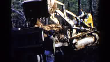 Birmingham Alabama (1957): Excavator Moves Dirt Into Construction Bin While