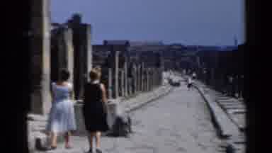 Rome Italy (1960): Two Men Working Hard To Unload A Large Delivery Of Lumber For