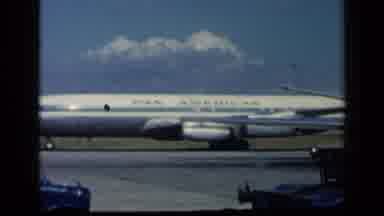 Vatican Italy (1960): A Pan American Plane Glides Down The Runway While Two Women