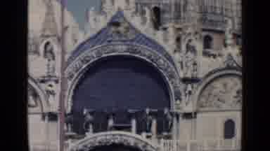 Venice Italy (1960): People Walking Past Entrance Of St Mark's Bascilica On A