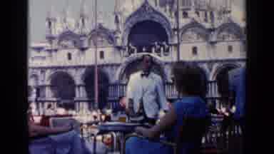Venice Italy (1960): Waiters Walking Up To Customers Offering Menus And Papers