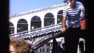 Venice Italy (1960): A Gondolier Ferries Passengers Through The Canals Of Venice