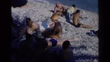 Venice Italy (1960): People Enjoying The Sun Near The Water In A Western City In