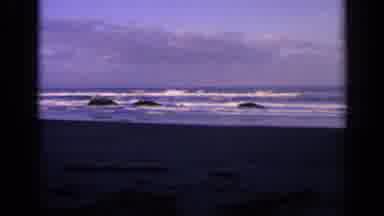 California USA (1963): Camera Pans Across The Ocean In The Distance With White
