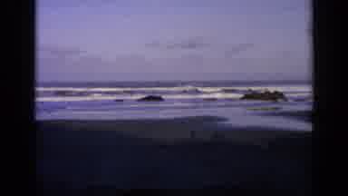 California USA (1963): Ocean Waves Breaking On A Beach That Is Deserted During The