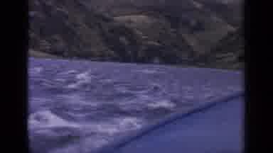 Idaho USA (1963): Rapid Waves Force The Boat To Sway On The Lake In The Mountains