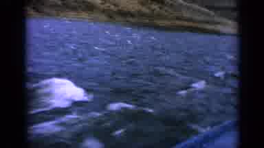 Idaho USA (1963): View Of Green Mountains And Blue Lake Water On A Clear Day