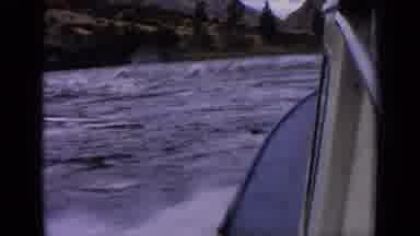 Idaho USA (1963): View Of Blue Water Waves And Green Trees On A Clear Day
