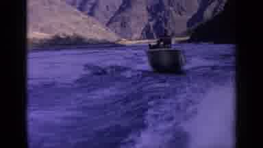 Idaho USA (1963): Roaring White Cap Waters Sturdy Boat Pushing Through The Waves