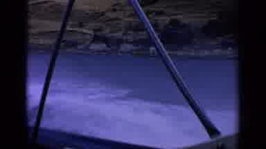Idaho USA (1963): Boat Running Through Small Waves In The Sea At High Speed