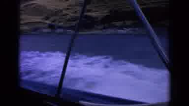 Idaho USA (1963): The Boat Speeds Through The Water And Creats White Waves As It