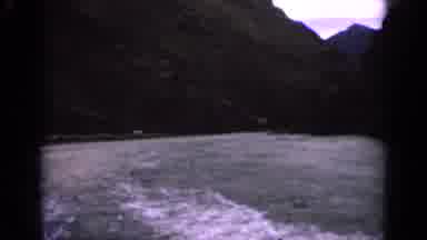 Idaho USA (1963): Lake Being Filmed From Behind A Boat As It Drives Down