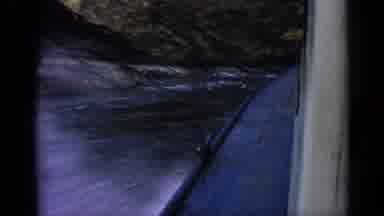 Idaho USA (1963): Blue Boat With Silver Horn Speeding Through Choppy Water
