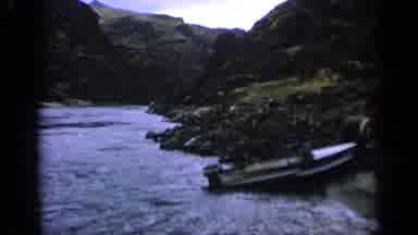 Idaho USA (1963): Boat Pulled Up On The Shore Of The Large Stream In The Beautiful