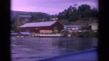 Idaho USA (1963): Building On The Side Of A Lake Followed By Flashing Bright