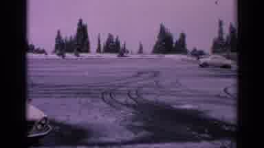 Washington USA (1963): A Panning Shot Shows A Nearly Empty Parking Lot In Winter