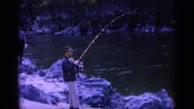 Washington USA (1963): Man With A Long Fishing Pole Fishing In A River During The