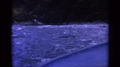 Washington USA (1963): Sailing On A Boat While Crashing Through Waves Of Water