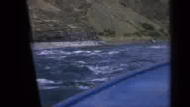 Washington USA (1963): Boat Cuts Through The Blue Water And Bounces Up And Down As