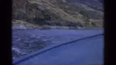 WASHINGTON USA-1963: View Of Green Mountains And Blue Lake Water On A Clear Day