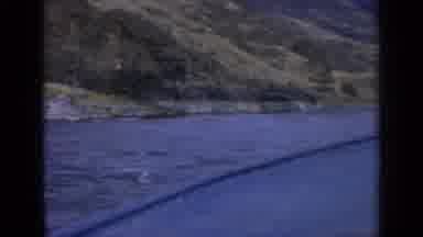 Washington USA (1963): Boat Sailing On A Body Of Water Headed Towards The Hillside