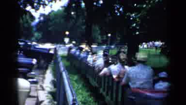 Chicago Illinois (1957): People Riding On A Miniature Train On A Small Carnival At