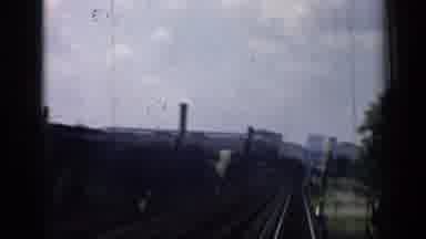 Chicago Illinois (1958): Brick Buildings And Trees As Seen By Train Passing