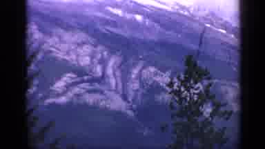 Colorado USA (1959): Birds-Eye View Of Snow Capped Mountain Gorge Pine Trees In