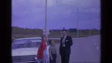 Colorado USA (1959): Family Leaves The Car And Dad Points To The Camera As They