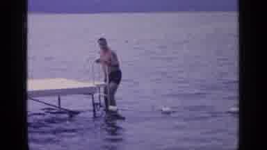 Greenwood Lake New York (1964): A Guy Seen Dipping His Feet In The Water To Test