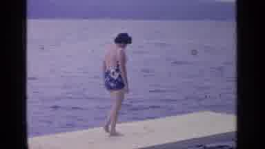 Greenwood Lake New York (1964): Woman About To Jump Off A Diving Platform Into The