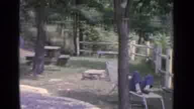Greenwood Lake New York (1964): Woman Sitting On A Backyard Bench Next To A Big