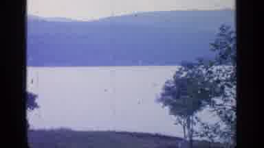 Greenwood Lake New York (1964): Scenic Shot Of A Lake And Trees With Mountains In