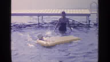 Greenwood Lake New York (1964): A Mother Of Two Teaching Her Children How To Swim