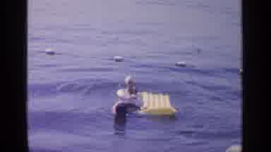 Greenwood Lake New York (1964): Person Resting On Yellow Inflatable Pool Raft On A