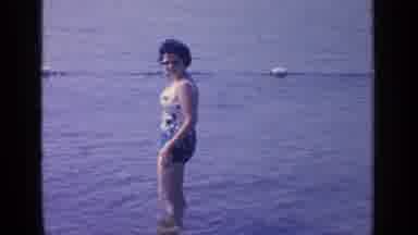 Greenwood Lake New York (1964): Woman Bathing And Riding Inflatable Device In