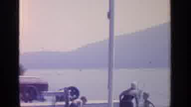 Greenwood Lake New York (1964): Little Girl In Jacket And Cap Lifts Puppy And