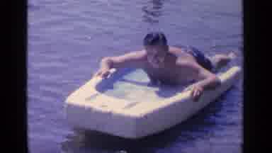 Greenwood Lake New York (1964): An Adult Male Trying To Learn How To Swim Using A