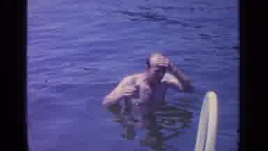 Greenwood Lake New York (1964): Man Touches His Heard While Drinking A Beer In His