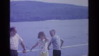Greenwood Lake New York (1964): People Leaning Against White Rail In Front Of