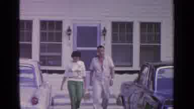 Greenwood Lake New York (1964): A Couple Leaving The House And Going Into Their